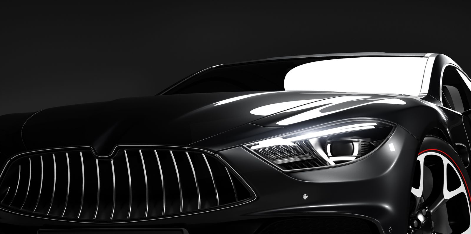 Close-up of a vehicle grille and headlight after detailing